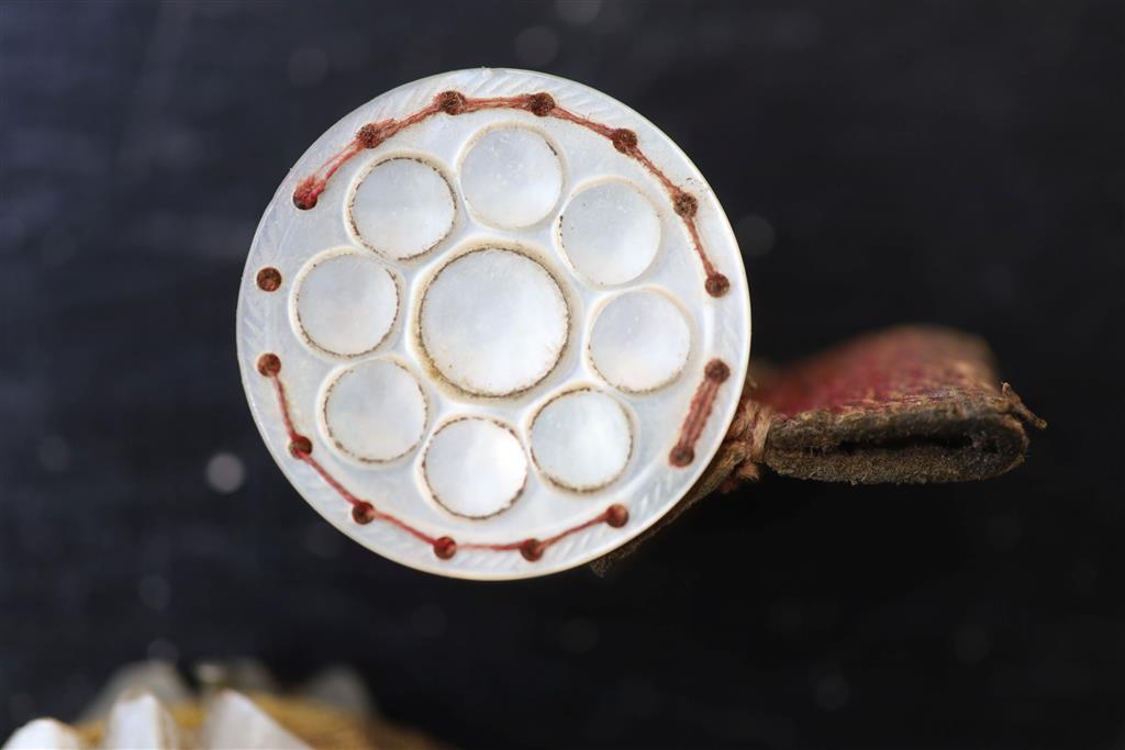 Eight assorted 19th century mother of pearl mounted pin cushions